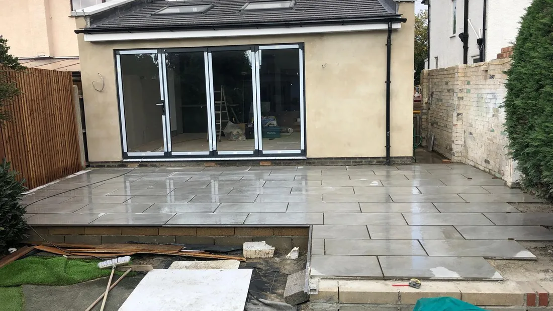 Single-storey rear extension on a semi-detached house, with a tiled roof, two rooflights and bifold doors